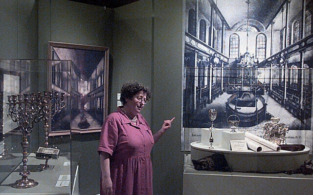 Illustrative: Riki Greenspan who conducts tours at the University of South Carolina McKissick Museum in Columbia, S.C., is shown in front of the exhibit featuring 300 years of southern Jewish life in the state April 30, 2002. (AP Photo/Lou Krasky)