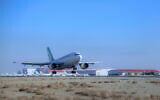 An Iranian Mahan Air plane lands at Tehran's Imam Khomeini International Airport on February 4, 2021. (Saeed Kaari/IKAC via AP) An Iranian Mahan Air plane lands at Tehran's Imam Khomeini International Airport on February 4, 2021. (Saeed Kaari/IKAC via AP)