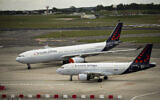 Planes from Brussels Airlines on the tarmac at Brussels Airport in Brussels May 12, 2020. (Francisco Seco/AP)