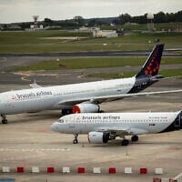 Planes from Brussels Airlines on the tarmac at Brussels Airport in Brussels May 12, 2020. (Francisco Seco/AP)
