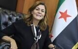 Syrian Minister of Social Affairs and Labor Hind Kabawat, speaks during an interview with the Associated Press, in Damascus, Syria, May 12, 2025. (AP Photo/Ghaith Alsayed)