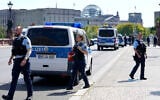 Illustrative: Police officers guard a bridge in Berlin, Germany, August 13, 2025. (AP Photo/Ebrahim Noroozi)