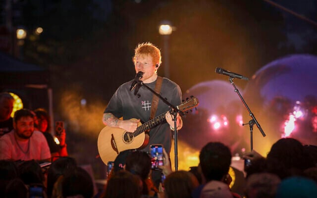 Singer-songwriter Ed Sheeran performs during "Ed Sheeran's Play: Live from New York" presented by TikTok at Domino Square in New York, Sept. 13, 2025. (Andy Kropa/Invision/AP)