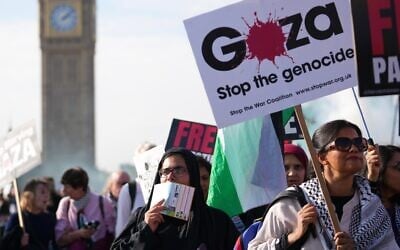 File: Demonstrators hold placards and banners during a pro Palestinian protest as they march through central London, October 11, 2025. (AP Photo/Joanna Chan) File: Demonstrators hold placards and banners during a pro Palestinian protest as they march through central London, October 11, 2025. (AP Photo/Joanna Chan)