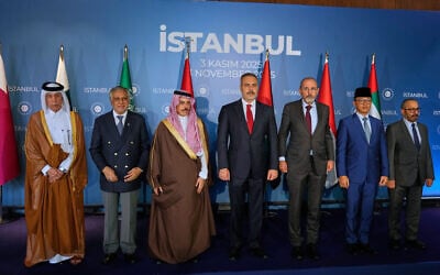 From left, Qatar’s Minister of State for Foreign Affairs Sultan bin Saad Al Muraikhi, Pakistan’s Deputy Prime Minister and Foreign Minister Mohammad Ishaq Dar, Saudi Arabia Foreign Minister Faisal bin Farhan Al-Saud, Turkish Foreign Minister Hakan Fidan, Jordanian Foreign Minister Ayman Safadi, Indonesia’s Foreign Minister Sugiono and United Arab Emirates’ Foreign Minister Khalifa Shaheen Al Marar pose for a group photo prior their meeting to discuss the ceasefire and next steps for Gaza, in Istanbul, Turkey, November 3, 2025. (AP Photo/Khalil Hamra)