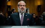 Rabbi Yehuda Kaploun arrives to a Senate Foreign Relations Committee confirmation hearing on his nomination to be the special envoy to monitor and combat anti-semitism, November 19, 2025, on Capitol Hill in Washington. (AP Photo/Julia Demaree Nikhinson)