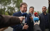 The UK’s Minister of State for the Middle East, North Africa, Afghanistan and Pakistan Stephen Doughty talks to the media after a meeting with Cypriot Foreign Minister Constantinos Kombos at the foreign ministry house in Nicosia, Cyprus, March 19, 2026. (AP Photo/Petros Karadjias)