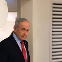 Prime Minister Benjamin Netanyahu arrives for a press conference in Jerusalem, March 19, 2026. (Ronen Zvulun, Pool Photo via AP)