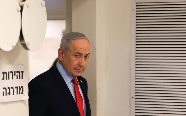 Prime Minister Benjamin Netanyahu arrives for a press conference in Jerusalem, March 19, 2026. (Ronen Zvulun, Pool Photo via AP)