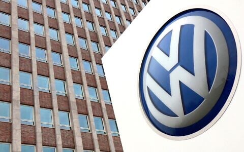 In this April 13, 2018 file photo, the Volkswagen logo is pictured in front of a company building in Wolfsburg, Germany. (AP/Michael Sohn)