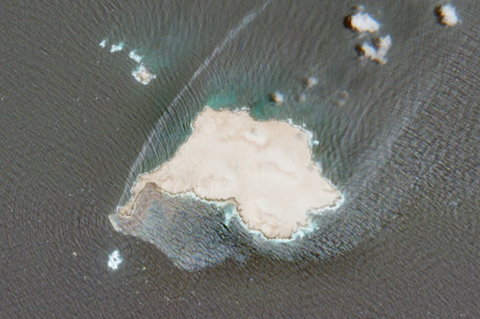 This satellite image released by the European Space Agency shows oil leaking from a grounded UK-sanctioned tanker near Qibliyah Island off the coast of Oman, July 28, 2026. (European Space Agency via AP)