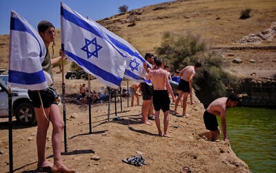Israelis enjoy a day at an ancient archaeological site known as Herod’s Pool, near the Israeli settlement of Petzael, which was filled with water earmarked for Palestinian farmland, in the West Bank’s Jordan Valley, on June 19, 2026. (AP Photo/Ohad Zwigenberg) Israelis enjoy a day at an ancient archaeological site known as Herod’s Pool, near the Israeli settlement of Petzael, which was filled with water earmarked for Palestinian farmland, in the West Bank’s Jordan Valley, on June 19, 2026. (AP Photo/Ohad Zwigenberg)
