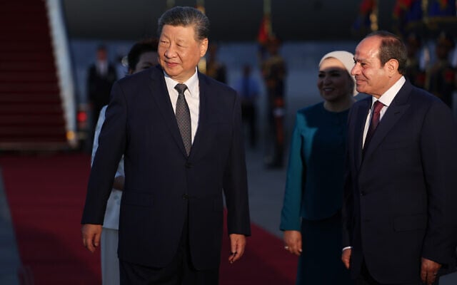 Chinese President Xi Jinping is welcomed by Egyptian President Abdel-Fattah el-Sissi upon his arrival at Cairo International Airport, Egypt, September 1, 2026. (Mohamed Abd El Ghany/Pool Photo via AP)