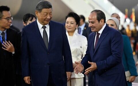 Egypt’s President Abdel Fattah al-Sisi, center right, and his wife Entissar Amer, right, welcome China’s President Xi Jinping and his wife Peng Liyuan as they arrive at Cairo International Airport, Cairo, Egypt, for an official visit to Egypt, September 1, 2026. (Khaled Desouki/Pool photo via AP)