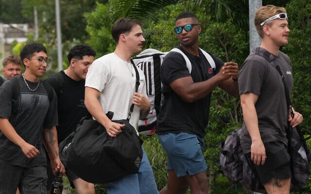 American service members from the USS Abraham Lincoln strike group arrive at a hotel in Pattaya, Thailand, September 2, 2026. (AP Photo/Sakchai Lalit)