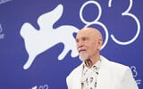 John Malkovich poses for photographers at the photo call for the film ‘Wild Horse Nine’ during the 83rd edition of the Venice Film Festival in Venice, Italy, on September 3, 2026. (Scott A Garfitt/Invision/AP)