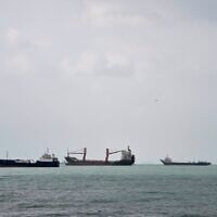 Commercial vessels lie anchored in the Strait of Hormuz off Bandar Abbas, Iran, September 4, 2026. (AP Photo/Vahid Salemi)