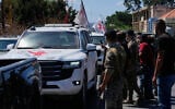 A Red Cross convoy escorts four released prisoners who were held in Israeli prisons as they arrive in the southern village of Mansouri, Lebanon, September 4, 2026. (AP Photo/Mohammed Zaatari)