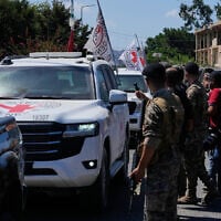 A Red Cross convoy escorts four released prisoners who were held in Israeli prisons as they arrive in the southern village of Mansouri, Lebanon, September 4, 2026. (AP Photo/Mohammed Zaatari)