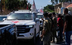 A Red Cross convoy escorts four released prisoners who were held in Israeli prisons as they arrive in the southern village of Mansouri, Lebanon, September 4, 2026. (AP Photo/Mohammed Zaatari)