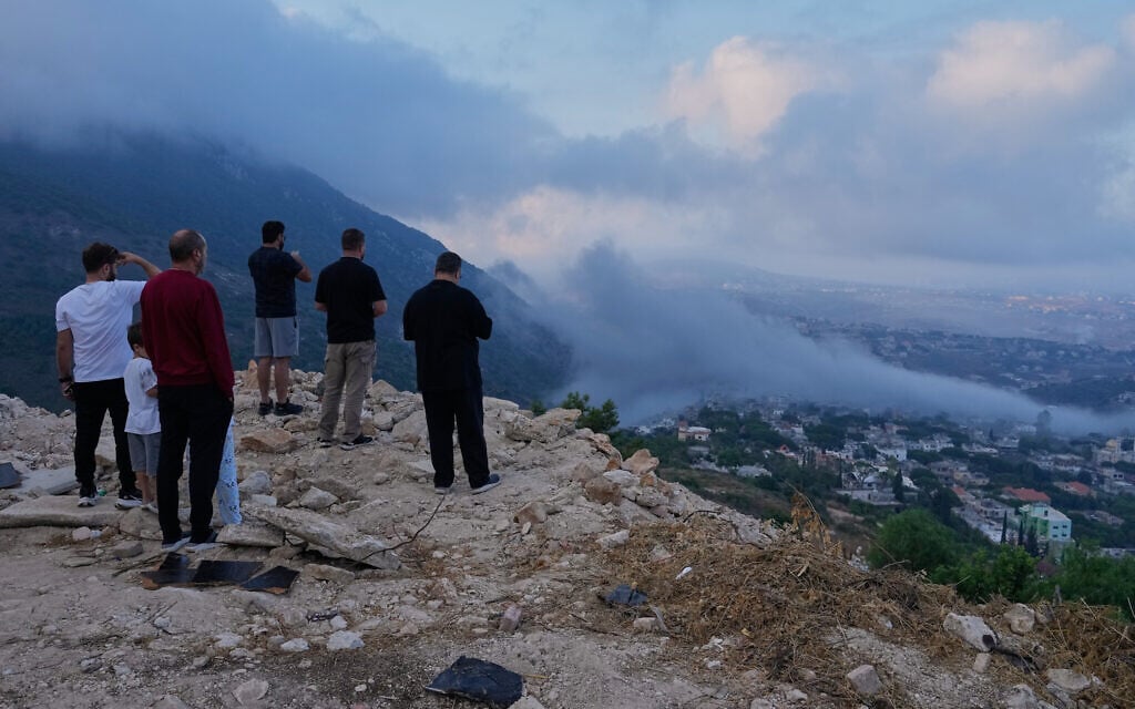 People watch a smoke rise from an Israeli airstrike that hit a house in Arab Salim village after an evacuation warning, southern Lebanon, September 6, 2026. (AP Photo/Mohammed Zaatari) People watch a smoke rise from an Israeli airstrike that hit a house in Arab Salim village after an evacuation warning, southern Lebanon, September 6, 2026. (AP Photo/Mohammed Zaatari)
