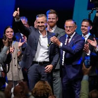 Top candidate Ulrich Siegmund shows thumbs up beside party leaders Tino Chrupalla and Alice Weidel, from left, at an election party of the “Alternative for Germany” (AfD) after the Saxony-Anhalt state election in Magdeburg, eastern Germany, September 6, 2026. (AP Photo/Matthias Schrader)