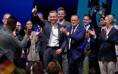 Top candidate Ulrich Siegmund shows thumbs up beside party leaders Tino Chrupalla and Alice Weidel, from left, at an election party of the “Alternative for Germany” (AfD) after the Saxony-Anhalt state election in Magdeburg, eastern Germany, September 6, 2026. (AP Photo/Matthias Schrader)