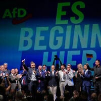 Top AfD candidate Ulrich Siegmund speaks in front of a reading “It starts here” at an election party of the Alternative for Germany (AfD) after the Saxony-Anhalt state elections in Magdeburg, eastern Germany, September 6, 2026. (AP Photo/Matthias Schrader)