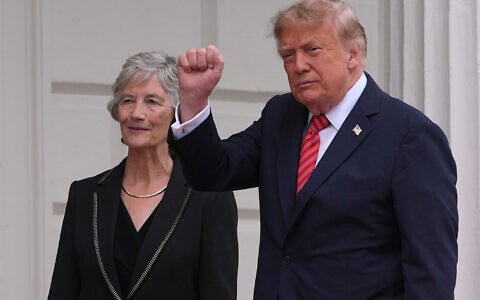 US President Donald Trump gestures as he is welcomed by Ireland’s President Catherine Connolly at Aras an Uachtarain in Dublin, September 12, 2026. (AP Photo/Kin Cheung)