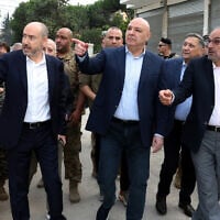 Lebanese President Joseph Aoun, center, gestures during a visit near the site where Israel captured a strategic hill earlier this month, in the city of Nabatiyeh, southern Lebanon, September 12, 2026. (Lebanese Presidency Press Office via AP)