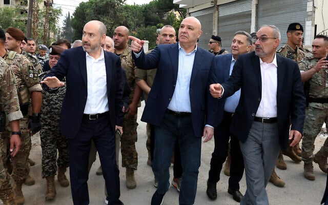 Lebanese President Joseph Aoun, center, gestures during a visit near the site where Israel captured a strategic hill earlier this month, in the city of Nabatiyeh, southern Lebanon, September 12, 2026. (Lebanese Presidency Press Office via AP)