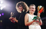 Mathilde Arcel, right, winner of the Coppa Volpi for best actress for the film ‘Woman Unknown,’ and the director May el-Toukhy, winner of the Golden Lion for best film, pose for photographers at the awards photo call during the closing ceremony of the 83rd edition of the Venice Film Festival in Venice, Italy, on September 12, 2026. (Scott A Garfitt/Invision/AP)