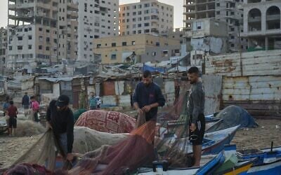 Palestinian fishermen work on their fishing nets in the morning at the damaged port of Gaza City, September 13, 2026. (AP Photo/Jehad Alshrafi) Palestinian fishermen work on their fishing nets in the morning at the damaged port of Gaza City, September 13, 2026. (AP Photo/Jehad Alshrafi)