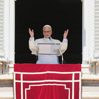 Pope Leo XIV blesses faithful during the Angelus noon prayer from the window of his studio overlooking St.Peter’s Square, at the Vatican, September 13, 2026. (AP Photo/Alessandra Tarantino)