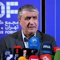 Head of Iran’s Atomic Energy Organization Mohammad Eslami speaks at a news briefing in Tehran, Iran, November 16, 2025. (Vahid Salemi/AP)