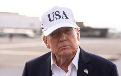 US President Donald Trump speaks with reporters before boarding Air Force One at Shannon Airport, September 13, 2026, in Shannon, Ireland. (AP Photo/Julia Demaree Nikhinson)