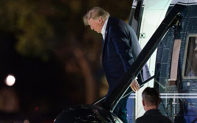 President Donald Trump steps off from Marine One upon his arrival at the Ellipse just outside of the White House, September 13, 2026, in Washington. (AP Photo/Jose Luis Magana)