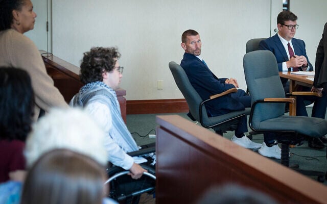 Jason Eaton watches as Hisham Awartani arrives to testify in Eaton’s trial in Burlington, Vt., September 14, 2026. (Glenn Russell/Pool photo via AP) Jason Eaton watches as Hisham Awartani arrives to testify in Eaton’s trial in Burlington, Vt., September 14, 2026. (Glenn Russell/Pool photo via AP)