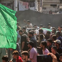 Palestinians carry the body of Hamas commander Ahmad al-Batash during his funeral after he was killed in an Israeli airstrike the day before, Gaza City, September 15, 2026. (AP Photo/Yousef Al Zanoun)