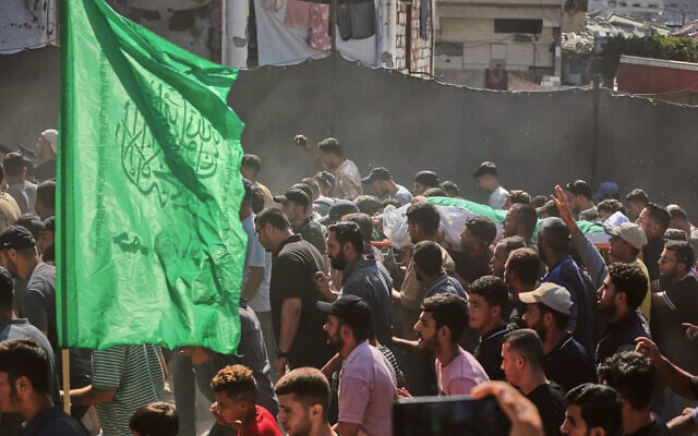 Palestinians carry the body of Hamas commander Ahmad al-Batash during his funeral after he was killed in an Israeli airstrike the day before, Gaza City, September 15, 2026. (AP Photo/Yousef Al Zanoun)