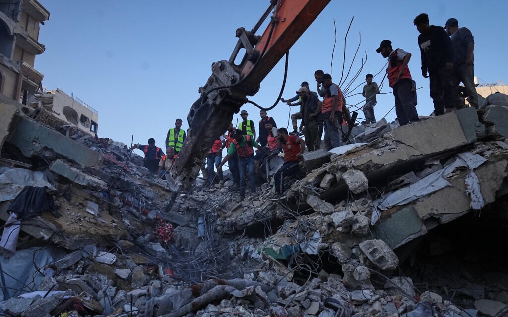 Palestinian crews search for bodies and survivors in the rubble of a collapsed building that housed displaced Palestinians and was heavily damaged during the Israel-Hamas war, in Gaza City, September 16, 2026. (AP Photo/Jehad Alshrafi) Palestinian crews search for bodies and survivors in the rubble of a collapsed building that housed displaced Palestinians and was heavily damaged during the Israel-Hamas war, in Gaza City, September 16, 2026. (AP Photo/Jehad Alshrafi)