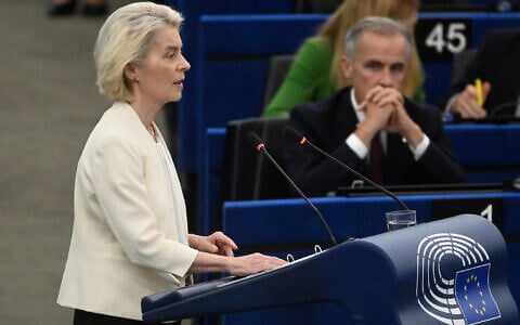 Canada's Prime Minister Mark Carney, right, listens to European Commission President Ursula von der Leyen, during the annual State of the European Union at the European Parliament in Strasbourg, eastern France, September 16, 2026. (Pascal Bastien/AP)