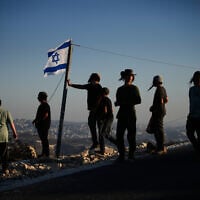 Israeli settlers gather to celebrate the inauguration of a newly built synagogue at the West Bank outpost of Homesh, September 16, 2026. (AP Photo/Ohad Zwigenberg)