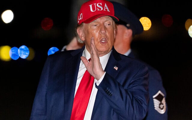 US President Donald Trump speaks to reporters as he arrives on Air Force One, September 16, 2026, at Joint Base Andrews, Maryland. (AP/Alex Brandon)
