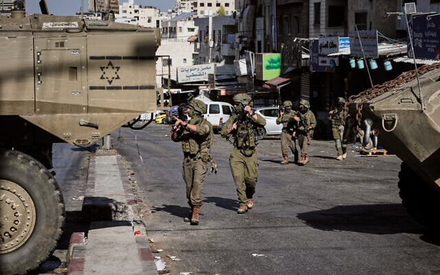 IDF soldiers are seen during an army raid in the West Bank camp of Al-Ain, near Nablus, September 17, 2026. (AP Photo/Majdi Mohammed)