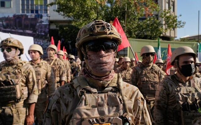 Armed personnel affiliated with Iran’s Islamic Revolutionary Guard Corps take part in the state-organized “Janfada,” or “Sacrifice for Iran,” military exercise in Tehran, Iran, September 18, 2026. (AP Photo/Vahid Salemi)