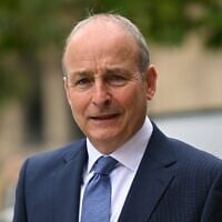 Ireland’s Prime Minister Micheal Martin arrives at Heron House, the base of the government’s Number 10 North, in Manchester, England, September 18, 2026. (Oli Scarff/Pool Photo via AP)