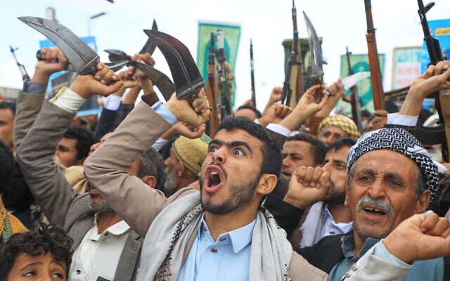 Supporters of Yemen’s Houthi rebels shout slogans during a rally in support of the group and to protest Saudi Arabia’s accusation that the Houthis targeted Islam’s holiest site, Mecca, in Sanaa, Yemen, September 18, 2026. (AP Photo/Osamah Abdulrahman)