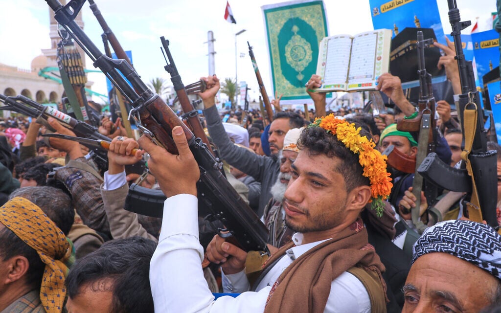 Supporters of Yemen’s Houthi rebels raise their machine guns during a rally in support of the group and to protest Saudi Arabia’s accusation that the Houthis targeted Islam’s holiest site of Mecca, in Sanaa, Yemen, September 18, 2026. (AP/Osamah Abdulrahman) Supporters of Yemen’s Houthi rebels raise their machine guns during a rally in support of the group and to protest Saudi Arabia’s accusation that the Houthis targeted Islam’s holiest site of Mecca, in Sanaa, Yemen, September 18, 2026. (AP/Osamah Abdulrahman)