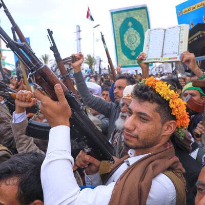 Supporters of Yemen’s Houthi rebels raise their machine guns during a rally in support of the group and to protest Saudi Arabia’s accusation that the Houthis targeted Islam’s holiest site of Mecca, in Sanaa, Yemen, September 18, 2026. (AP/Osamah Abdulrahman) Supporters of Yemen’s Houthi rebels raise their machine guns during a rally in support of the group and to protest Saudi Arabia’s accusation that the Houthis targeted Islam’s holiest site of Mecca, in Sanaa, Yemen, September 18, 2026. (AP/Osamah Abdulrahman)
